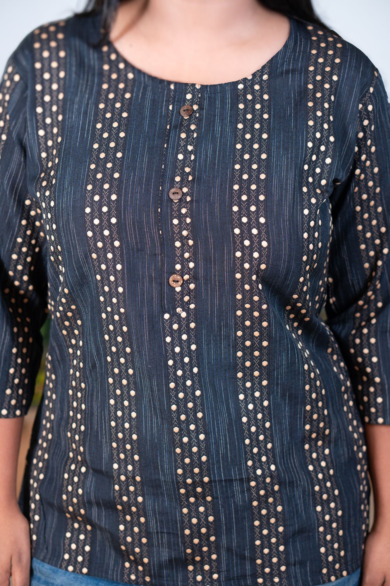Black tunic thread waiving
