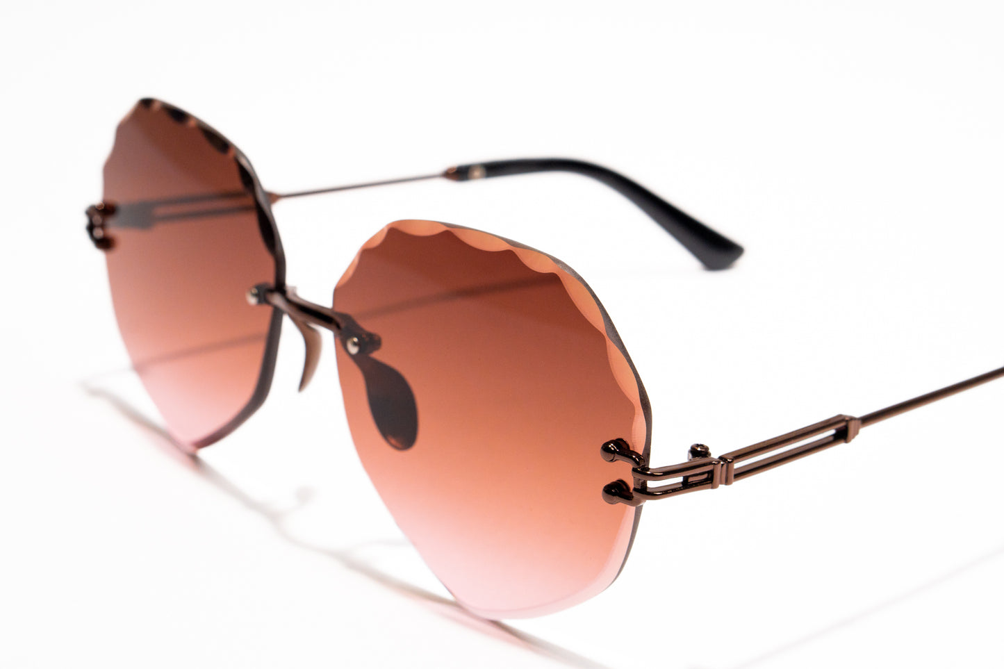 655. Celebrity Rimless diamond cut UV400 Retina protected cooling glass